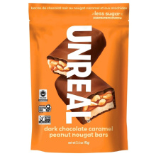 Barres de nougat au caramel et aux arachides enrobées de chocolat noir irréel, 95g.