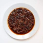 Lifestyle 1 of Momofuku Chili Crunch Oil - Chili Crisp Oil - Chili Crunch Canada - Crunchy Garlic Chili Oil