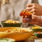 Lifestyle 2 of Momofuku Chili Crunch Oil - Chili Crisp Oil - Chili Crunch Canada - Crunchy Garlic Chili Oil