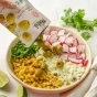 Lifestyle 1 of Poshi Premium Green Pitted Olives with Chili & Oregano - Olives For Charcuterie Boards - Pitted Green Olives - Low Calorie Olives