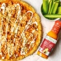 Lifestyle 1 of Primal Kitchen Hot Buffalo Sauce - Vegan Buffalo Sauce - Keto Buffalo Sauce - Buffalo Wing Sauce
